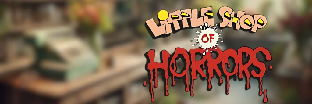 Text reads 'Little Shop of Horrors' with a blurred background of a floral shop and vintage cash register.