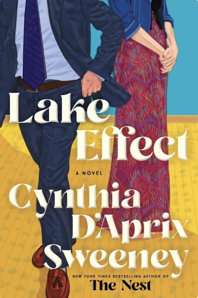 A man in a suit and a woman in a patterned dress stand together, promoting the novel "Lake Effect.