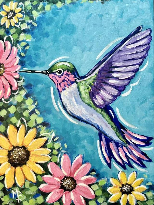 A colorful hummingbird hovers near pink and yellow flowers against a blue background.