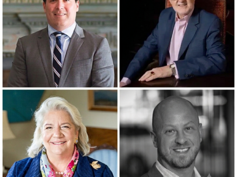Four panelists pose for a discussion, each in a separate quadrant.