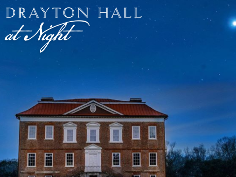 Drayton Hall illuminated at night, showcasing its historic architecture against a starry sky.